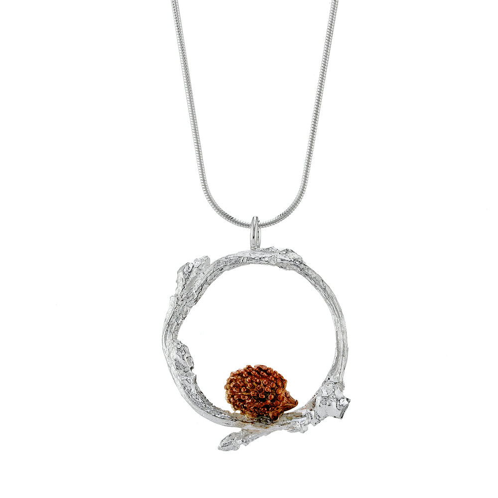 Hedgehog in a twig circle pendant