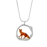 Small fox in a twig circle pendant