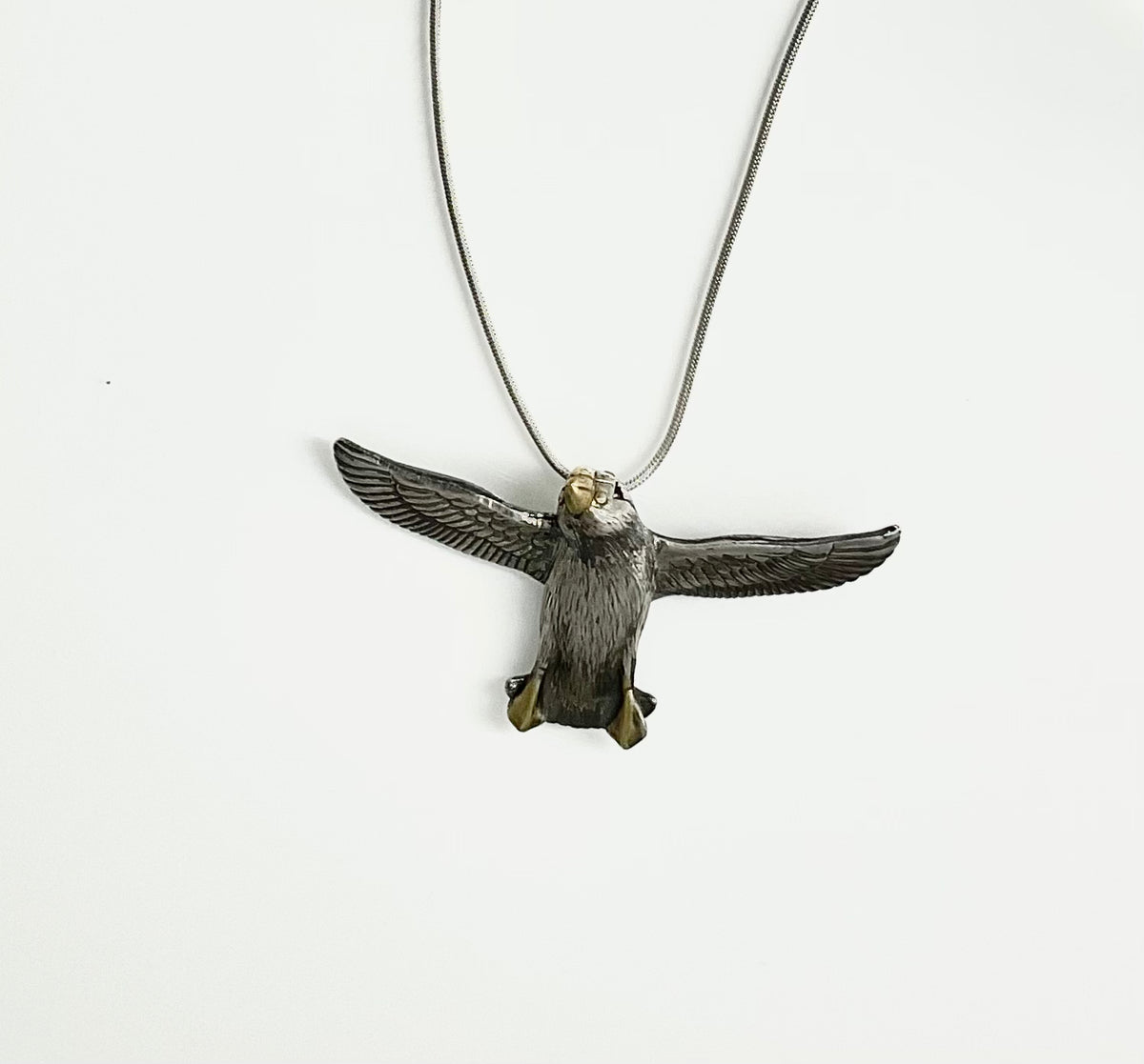 Incoming .. puffin in flight pendant