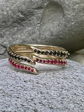 Interlocking serpent ruby ring